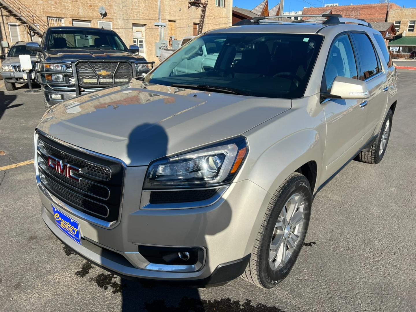 2016 Beige /Charcoal GMC Acadia SLT (1GKKVRKD2GJ) with an 3.6L V6 engine, automatic transmission, located at 116 5th Avenue South, Lewistown, MT, 59457, 47.063877, -109.427879 - Clean local trade with lots of options! Heated leather, sunroof, DVD! - Photo#5